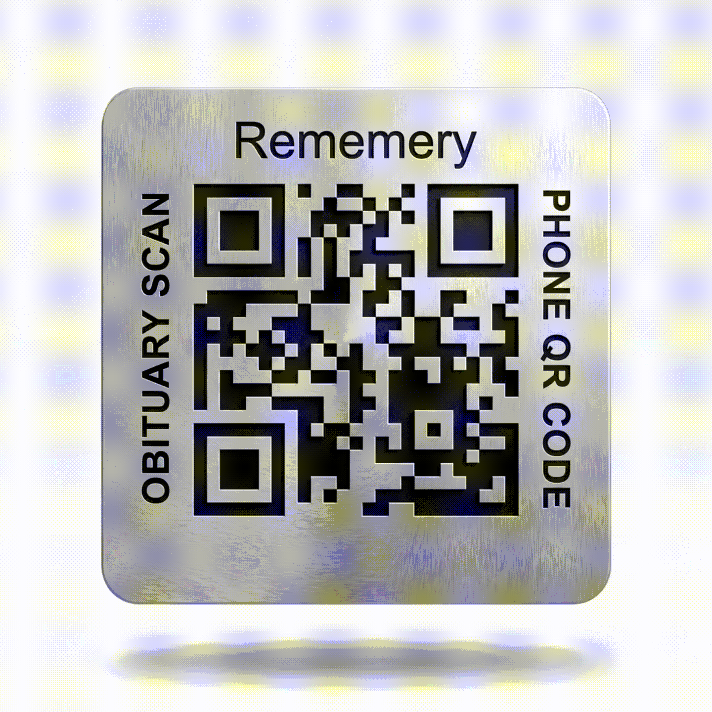 The laser-etched titanium Legacy Plaque rotating to show its finish